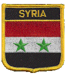 Shield Flag Patch of Syria - 3x2½" embroidered Shield Flag Patch of Syria.<BR>Combines with our other Shield Flag Patches for discounts.